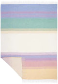 A rectangular woven throw blanket with horizontal pastel stripes in blue, purple, green, cream, pink, and yellow, finished with white fringe on two short ends and one corner turned down to show texture.